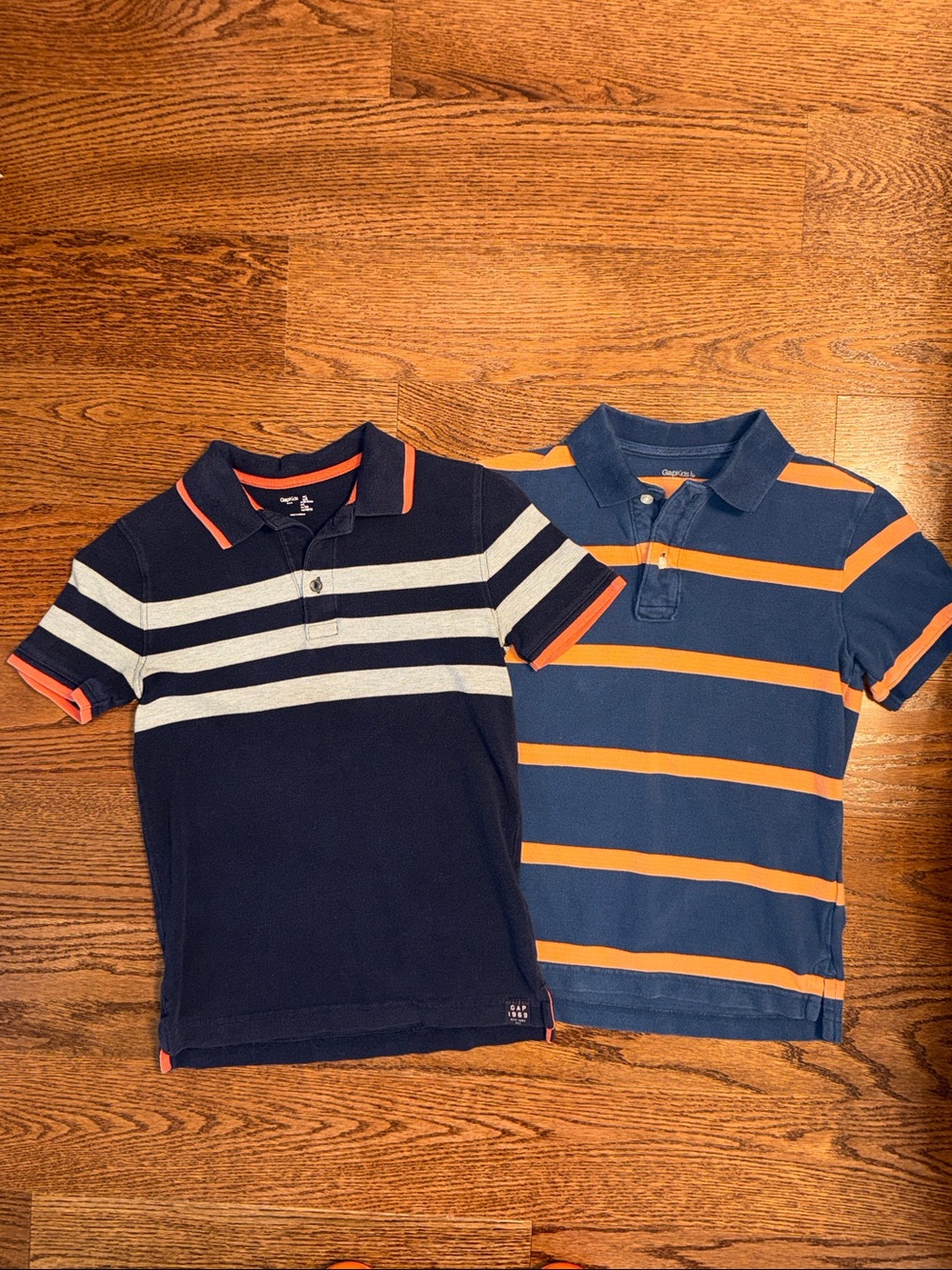 Size L/10 boys bundle of 2 Gap Kids short sleeve polo shirts.